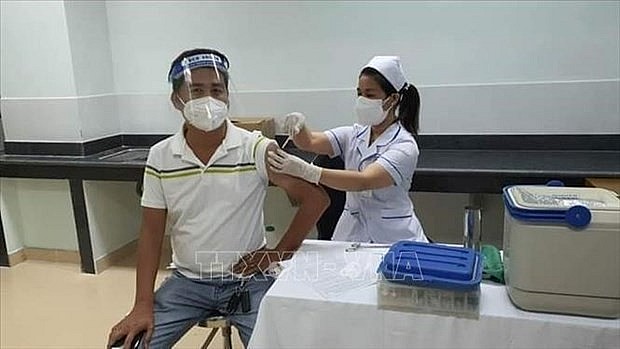 Covid-19 vaccination. Photo: VNA