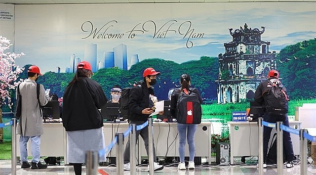 Foreign nationals from Japan arrived at Nội Bài International Airport, Hà Nội, on January 1, 2022. — VNA Foreign nationals from Japan arrived at Nội Bài International Airport, Hà Nội, on January 1, 2022. — VNA