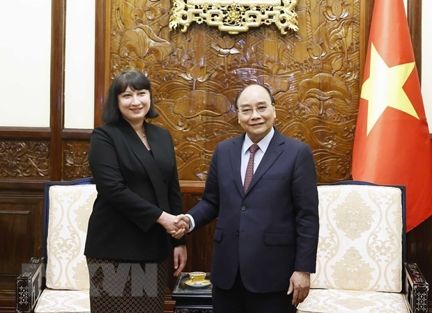 President Nguyen Xuan Phuc (R) and Romanian Ambassador Cristina Romila. Photo: VNA President Nguyen Xuan Phuc (R) and Romanian Ambassador Cristina Romila. Photo: VNA