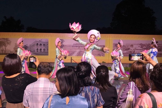 Visitors enjoy a dance on the glass covering the archaeological excavation area at the Thang Long Imperial Citadel as part of the tour last year. Photo: VNA Visitors enjoy a dance on the glass covering the archaeological excavation area at the Thang Long Imperial Citadel as part of the tour last year. Photo: VNA