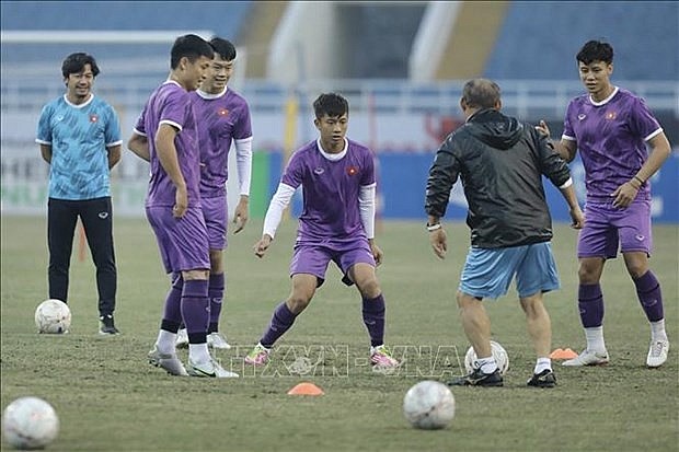 Vietnamese players practice for the match against Indonesia tonight. Photo: VNA Vietnamese players practice for the match against Indonesia tonight. Photo: VNA