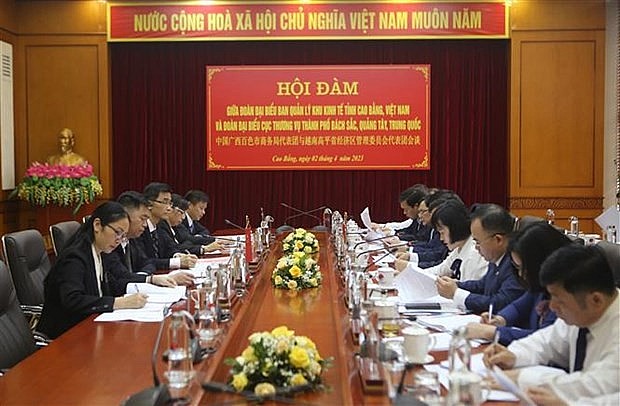 An overview of the working session between the two localities. (Photo: VNA) An overview of the working session between the two localities. (Photo: VNA)