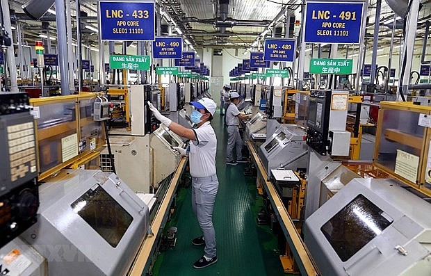 More and more multinationals and big investors have continuously invested in Vietnam. - Illustrative image (Photo: VNA) More and more multinationals and big investors have continuously invested in Vietnam. - Illustrative image (Photo: VNA)