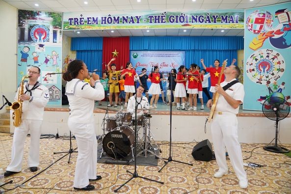 Sailors on Navy Aircraft Carrier Visit Orphans in Da Nang City Sailors on Navy Aircraft Carrier Visit Orphans in Da Nang City