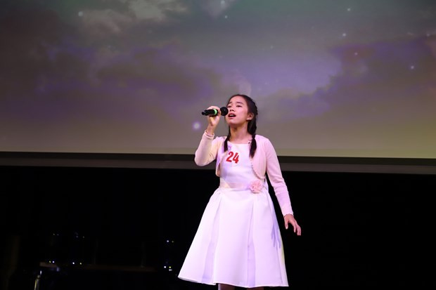 Contestant Phan Trang Anh, with the song First Overseas Vietnamese Junior Talent Show Held in London