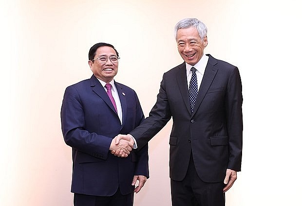 Prime Minister Pham Minh Chinh (left) and his Singaporean counterpart Lee Hsien Loong at their meeting ahead of the ASEAN-US Special Summit in the US. (Photo: VNA) Prime Minister Pham Minh Chinh (left) and his Singaporean counterpart Lee Hsien Loong at their meeting ahead of the ASEAN-US Special Summit in the US. (Photo: VNA)
