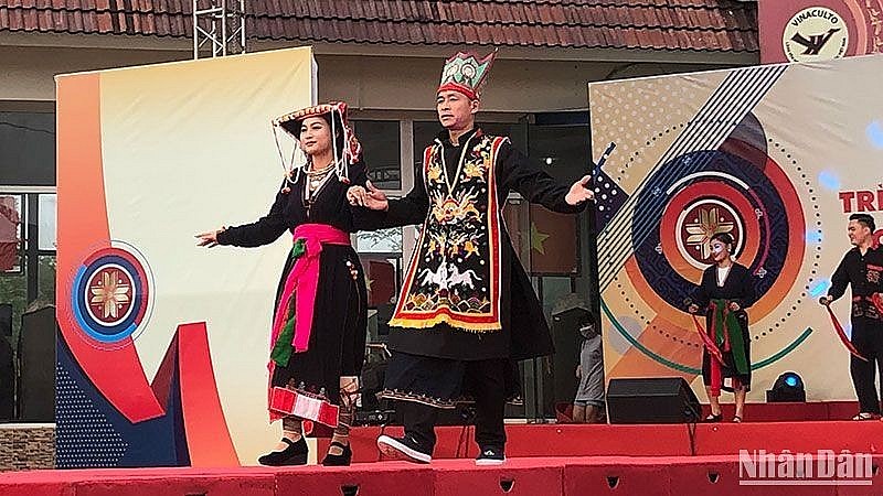Performance of national costumes at the Vietnam National Village for Ethnic Culture and Tourism. Performance of national costumes at the Vietnam National Village for Ethnic Culture and Tourism.