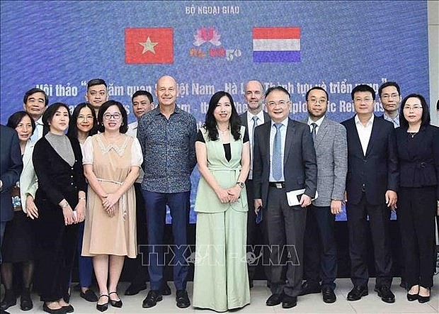 Vietnamese Deputy Minister of Foreign Affairs Le Thi Thu Hang and delegates (Photo: VNA)