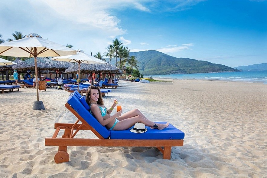 A Russian tourist in Nha Trang beach before the Covid-19 pandemic. Photo: realtimes.vn A Russian tourist in Nha Trang beach before the Covid-19 pandemic. Photo: realtimes.vn