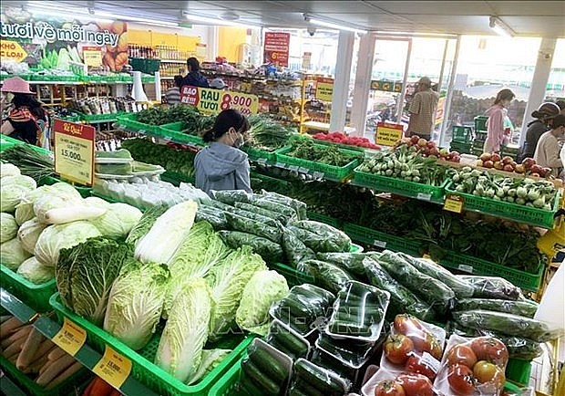 People shop at a Bach Hoa Xanh mini-mart in Ho Chi Minh City. (Photo: VNA) People shop at a Bach Hoa Xanh mini-mart in Ho Chi Minh City. (Photo: VNA)