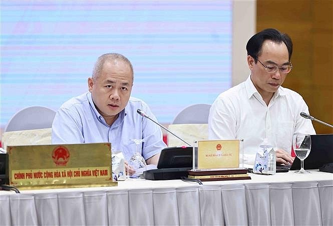 Deputy Minister of Planning and Investment Do Thanh Trung (left) speaks at the Government’s regular press conference on May 4. (Photo: VNA) Deputy Minister of Planning and Investment Do Thanh Trung (left) speaks at the Government’s regular press conference on May 4. (Photo: VNA)