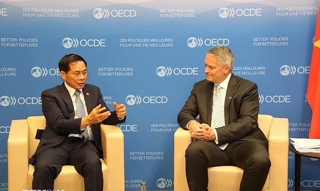 Minister of Foreign Affairs Bui Thanh Son (left) and OECD Secretary-General Mathias Cormann. Minister of Foreign Affairs Bui Thanh Son (left) and OECD Secretary-General Mathias Cormann.