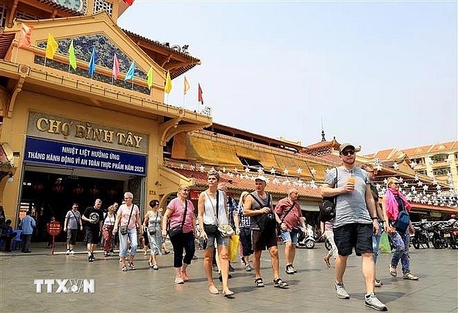Foreign visitors at Binh Tay market, HCM City (Photo: VNA) Foreign visitors at Binh Tay market, HCM City (Photo: VNA)
