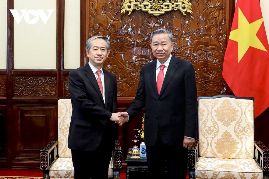 Newly elected President To Lam (R) shaking hands with Chinese Ambassador to Vietnam ahead of their meeting in Hanoi on June 11 Newly elected President To Lam (R) shaking hands with Chinese Ambassador to Vietnam ahead of their meeting in Hanoi on June 11