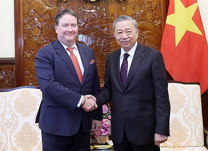 President To Lam (right) and US Ambassador to Vietnam Marc Evans Knapper. (Photo: VNA) President To Lam (right) and US Ambassador to Vietnam Marc Evans Knapper. (Photo: VNA)