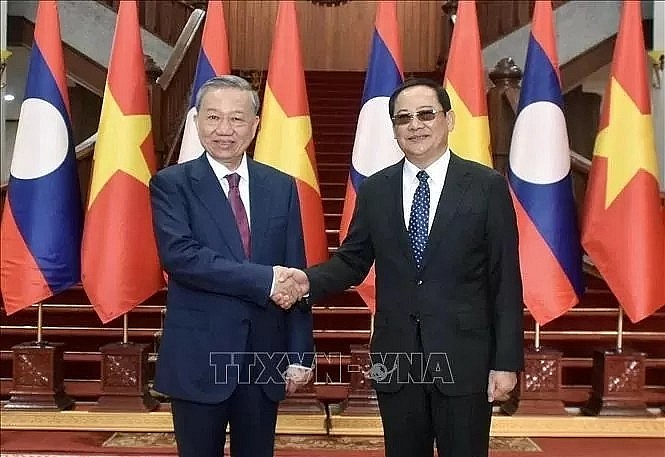 President To Lam meets Lao Prime Minister Sonexay Siphandone in Vientiane. President To Lam meets Lao Prime Minister Sonexay Siphandone in Vientiane.