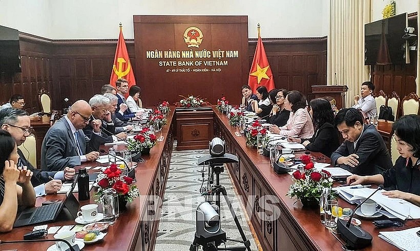 The meeting between Governor of the State Bank of Vietnam (SBV) Nguyen Thi Hong and AIIB President Jin Liqun. (Photo: VNA) The meeting between Governor of the State Bank of Vietnam (SBV) Nguyen Thi Hong and AIIB President Jin Liqun. (Photo: VNA)