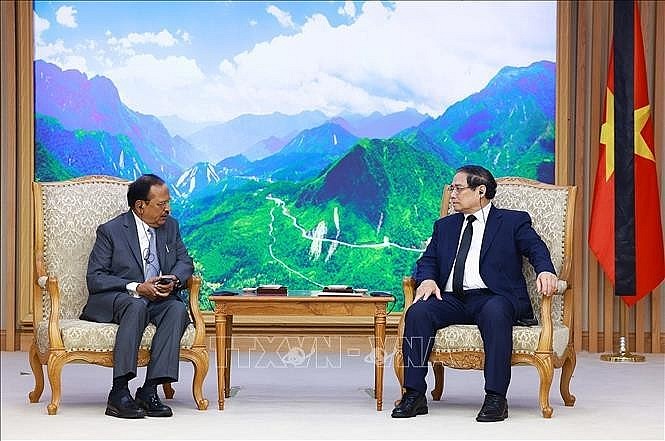 Prime Minister Pham Minh Chinh receives in Hanoi on July 24 National Security Advisor of India Ajit Doval, who is now in Vietnam to attend the funeral for General Secretary of the Communist Party of Vietnam Nguyen Phu Trong. (Photo: VNA) Prime Minister Pham Minh Chinh receives in Hanoi on July 24 National Security Advisor of India Ajit Doval, who is now in Vietnam to attend the funeral for General Secretary of the Communist Party of Vietnam Nguyen Phu Trong. (Photo: VNA)