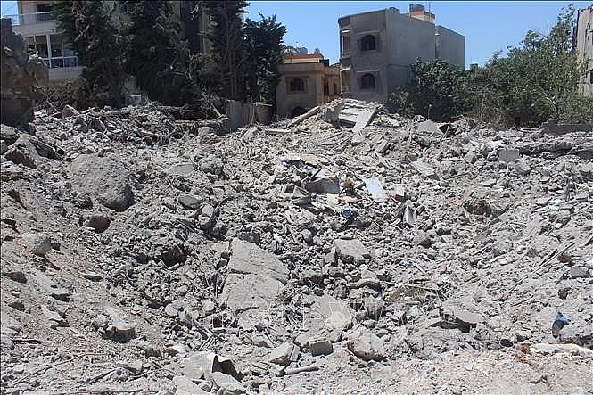 Building destroyed in Israeli Airstrike in Houla, Lebanon, on July 21, 2024. (Photo: Xinhua/VNA) Building destroyed in Israeli Airstrike in Houla, Lebanon, on July 21, 2024. (Photo: Xinhua/VNA)