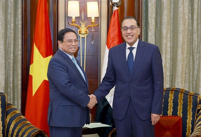 Prime Minister Phạm Minh Chính (left) meets with his Egyptian counterpart Mostafa Madbouly in Riyadh on Tuesday (local time), on the occasion of his participation in the 8th Future Investment Initiative (FII) Summit and his working visit to Saudi Arabia. — VNA/VNS Photo Dương Giang Prime Minister Phạm Minh Chính (left) meets with his Egyptian counterpart Mostafa Madbouly in Riyadh on Tuesday (local time), on the occasion of his participation in the 8th Future Investment Initiative (FII) Summit and his working visit to Saudi Arabia. — VNA/VNS Photo Dương Giang