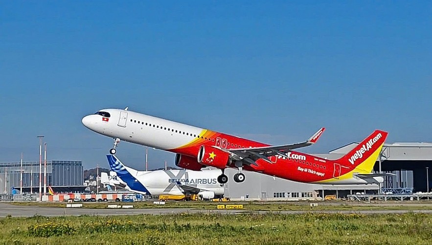 Vietjet welcomes a new aircraft to its fleet, enhancing capacity for the Lunar New Year travel season. (Photo: N. Huyen) Vietjet welcomes a new aircraft to its fleet, enhancing capacity for the Lunar New Year travel season. (Photo: N. Huyen)