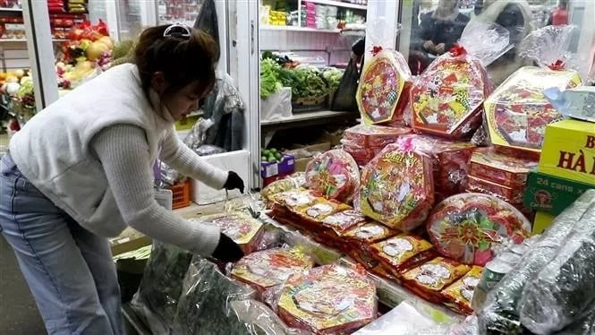 Stalls serving Vietnamese Lunar New Year at Sadovod market, Moscow, Russia. Stalls serving Vietnamese Lunar New Year at Sadovod market, Moscow, Russia.