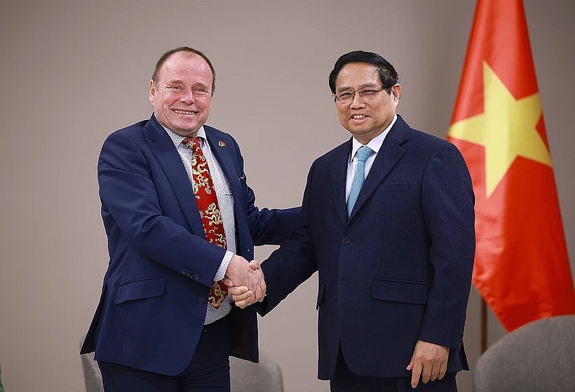 Prime Minister Pham Minh Chinh (R) hosts a reception in Prague on January 18 afternoon (local time) for Chairman of the Czech - Vietnamese Friendship Association Milos Kusy. (Photo: VNA) Prime Minister Pham Minh Chinh (R) hosts a reception in Prague on January 18 afternoon (local time) for Chairman of the Czech - Vietnamese Friendship Association Milos Kusy. (Photo: VNA)