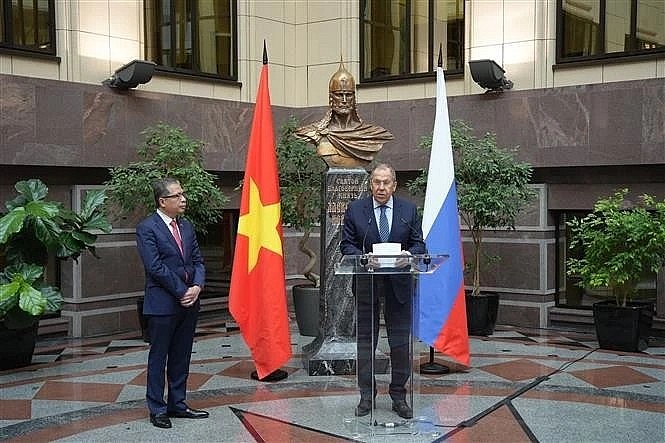 Russian Minister of Foreign Affairs Sergei Lavrov (R) speaks at the opening of the exhibition marking the 75th founding anniversary of diplomatic ties between Vietnam and Russia in Moscow on February 11. (Photo: VNA) Russian Minister of Foreign Affairs Sergei Lavrov (R) speaks at the opening of the exhibition marking the 75th founding anniversary of diplomatic ties between Vietnam and Russia in Moscow on February 11. (Photo: VNA)