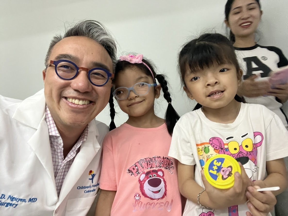 Dr. Phuong Nguyen (far left), Co-founder, Medical Director of NUOY, takes a photo with a young patient. (Photo: NUOY) Dr. Phuong Nguyen (far left), Co-founder, Medical Director of NUOY, takes a photo with a young patient. (Photo: NUOY)