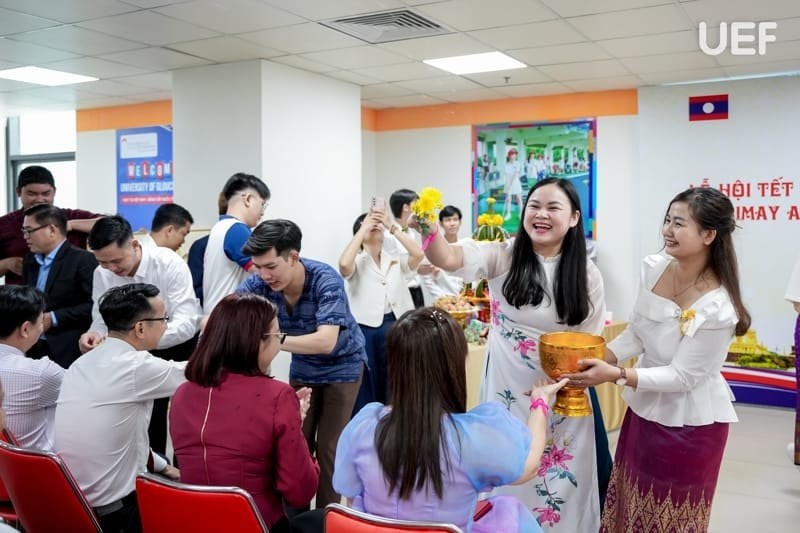 Lao and Cambodian students at the University of Economics and Finance in Ho Chi Minh City joyfully celebrate the traditional New Year. (Photo: UEF HCMC) Lao and Cambodian students at the University of Economics and Finance in Ho Chi Minh City joyfully celebrate the traditional New Year. (Photo: UEF HCMC)