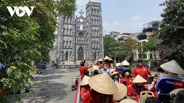 Tourists visit St. Joseph's Cathedral in Hanoi.