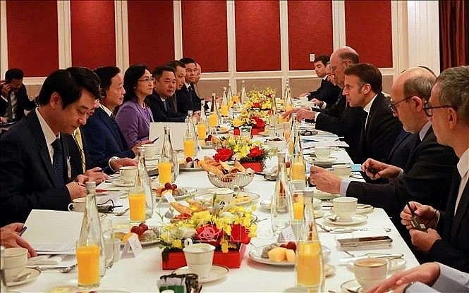 At the working breakfast (Photo: VNA)