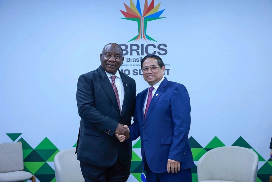 Vietnamese Prime Minister Pham Minh Chinh (R) meets South African President Cyril Ramaphosa in Rio de Janeiro, Brazil, on July 6. (Photo: VGP) Vietnamese Prime Minister Pham Minh Chinh (R) meets South African President Cyril Ramaphosa in Rio de Janeiro, Brazil, on July 6. (Photo: VGP)