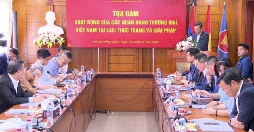 An overview of the seminar to look into operations of Vietnamese banks in Laos. (Photo: VNA) An overview of the seminar to look into operations of Vietnamese banks in Laos. (Photo: VNA)