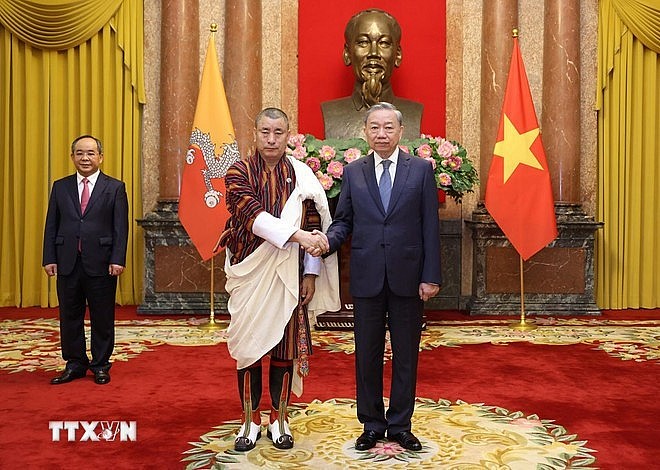 Party General Secretary and then State President To Lam (right) receives Ambassador of Bhutan to Vietnam Kinzang Dorji, who comes to present his credentials on September 17, 2024. (Photo: VNA)