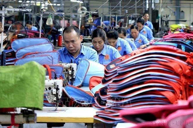 The main export items of Viet Nam to Bulgaria include cotton yarn, coffee beans, natural rubber, rice, cashew nuts, garments, handbags, and leather shoes. In the photo: Production of bags, backpacks, and handbags at Ladoda Leather Products Trading – Service – Manufacturing Import-Export Company. (Photo: Tuan Anh/VNA).