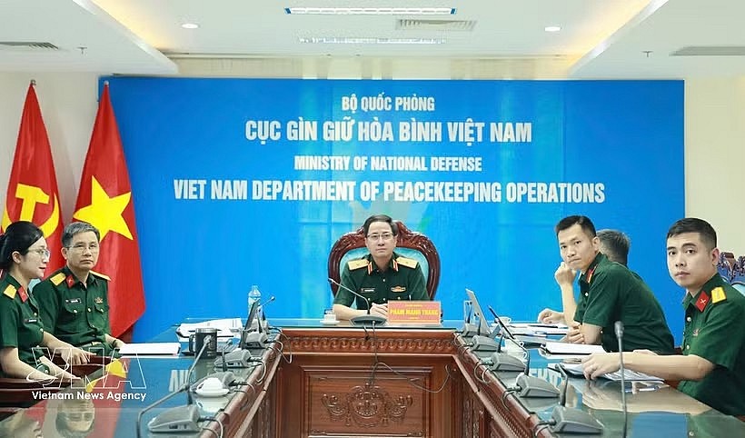The Vietnamese delegation led by Major General Pham Manh Thang, Director of the Vietnam Department of Peacekeeping Operations, at the 10th meeting of the ASEAN Peacekeeping Centres Network (APCN), held online from May 4–8. (Photo: VNA) The Vietnamese delegation led by Major General Pham Manh Thang, Director of the Vietnam Department of Peacekeeping Operations, at the 10th meeting of the ASEAN Peacekeeping Centres Network (APCN), held online from May 4–8. (Photo: VNA)