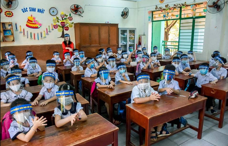 chinese students wear adorable social distancing wings at school