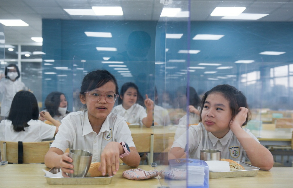 chinese students wear adorable social distancing wings at school