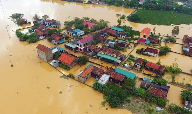 undefined Houses in Central Vietnam inundated in floodwater (Photo: Luat Vietnam)