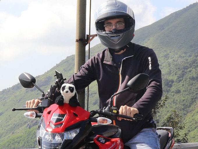 Tobias usually travel to the North by motorbike. Photo: VNE 2737-khach-tay
