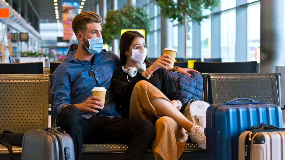 Photo: Getty Images 5241117180724-passportairportcouple