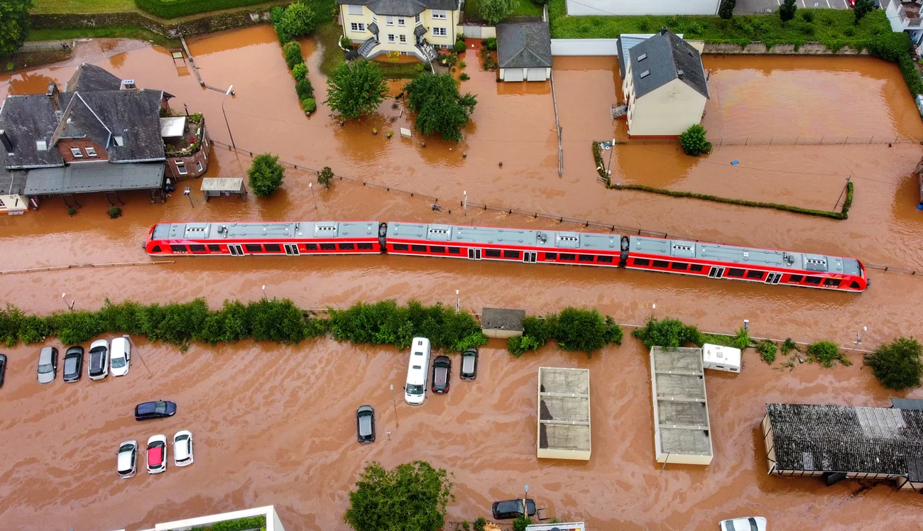 A regional train is stuck in floodwaters at a station in Kordel, Germany. Power went out, and the train came to a halt on Wednesday. Sebastian Schmitt/Picture Alliance/Getty Images A regional train is stuck in floodwaters at a station in Kordel, Germany. Power went out, and the train came to a halt on Wednesday. Sebastian Schmitt/Picture Alliance/Getty Images