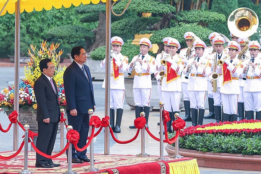 Prime Minister Pham Minh Chinh presided over a ceremony to welcome Lao Prime Minister Phankham Viphavanh for his official visit to Vietnam on January 8, 2022 at the Presidential Palace. (Source: VNA) Prime Minister Pham Minh Chinh presided over a ceremony to welcome Lao Prime Minister Phankham Viphavanh for his official visit to Vietnam on January 8, 2022 at the Presidential Palace. (Source: VNA)