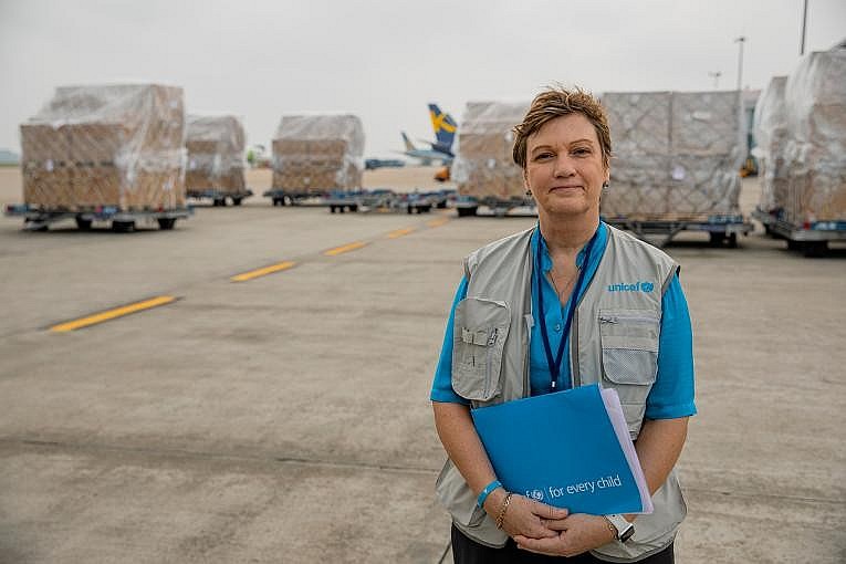 Ms Rana Flower, UNICEF Representative in Viet Nam stands in front of the first shipment of 811,200 doses of COVID-19 Vaccine supported by COVAX on 1st Apr 2021 at the Noi Bai International Airport. Ms Rana Flower, UNICEF Representative in Viet Nam stands in front of the first shipment of 811,200 doses of COVID-19 Vaccine supported by COVAX on 1st Apr 2021 at the Noi Bai International Airport.