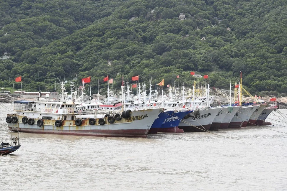 Boats are moored to take shelter in waters off Sansha town in Xiapu county in southeastern China’s Fujian province on Monday. Photo: Xinhua 2602 boat