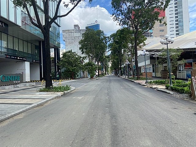 Nam Kỳ Khởi Nghĩa Street is deserted even before 6pm on July 26. VNA/VNS.Photo Mạnh Linh- Hoàng Tuyết Nam Kỳ Khởi Nghĩa Street is deserted even before 6pm on July 26. VNA/VNS.Photo Mạnh Linh- Hoàng Tuyết