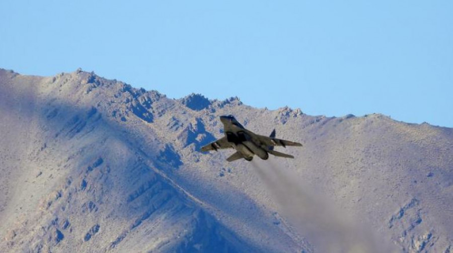 A file photo of an Indian fighter plane flying over a mountain range in Leh, in the Ladakh region. Reuters https://tkpo.st/2RjOlx5 4650 jet
