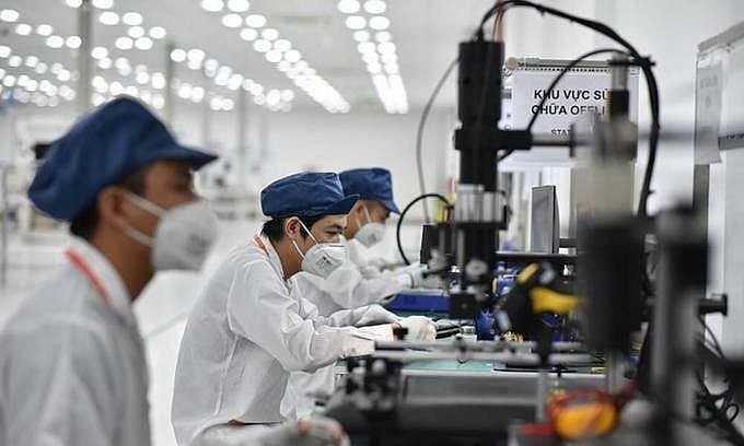 Employees work at a smartphone factory in Hai Phong City, northern Vietnam. Photo by VnExpress