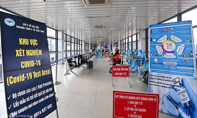 A Covid-19 testing area at Hanoi's Noi Bai Airport, July 2021. Photo by VnExpress/Giang Huy A Covid-19 testing area at Hanoi's Noi Bai Airport, July 2021. Photo by VnExpress/Giang Huy